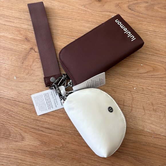 Lululemon Athletic Dual Pouch Wristlet Wallet Lava Cake Light Ivory NWT - Picture 1 of 6
